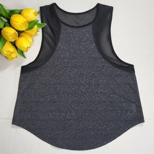 Lorna Jane top in black, four-way stretch, mesh holes keep you super cool.